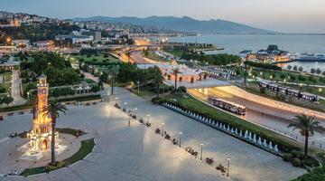 A photo from above of the İzmir waterfront. Mountains are visible in the background