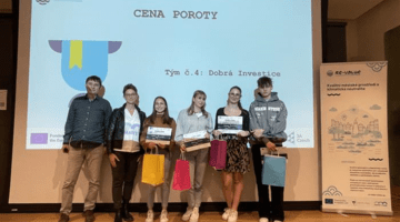 A photo of a group of students presenting